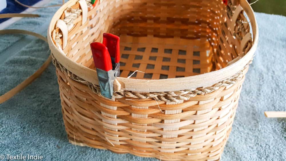 clamping the rim reed to the basket 