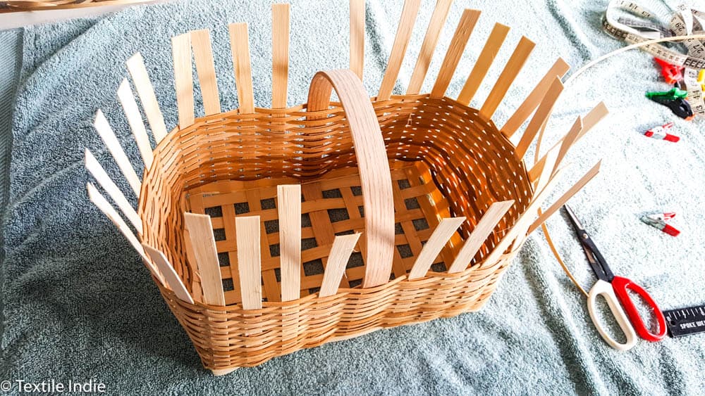 outside view of a market basket as it's being woven 