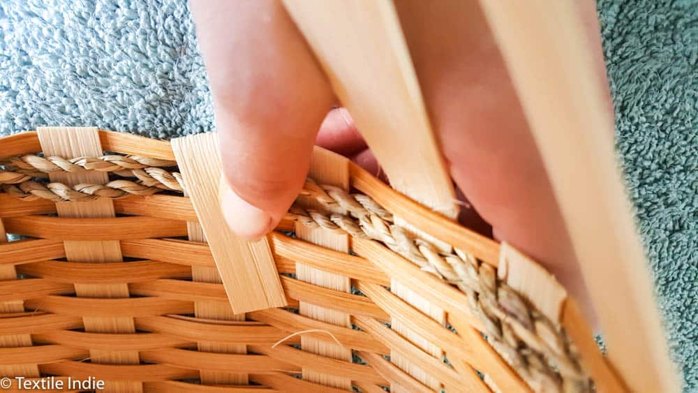 tucking the outside weavers into the basket 