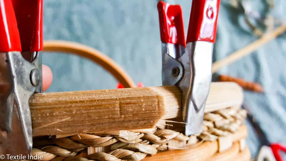 clamping the rim reed to the basket