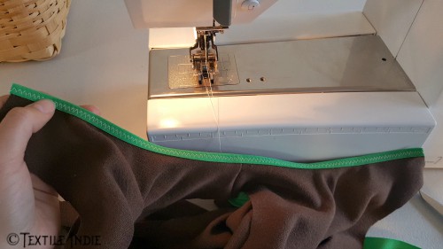 Fold over elastic sewn to neckline