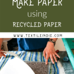 Handmade paper laying on a towel while person lifts the couch sheet from the wet material.