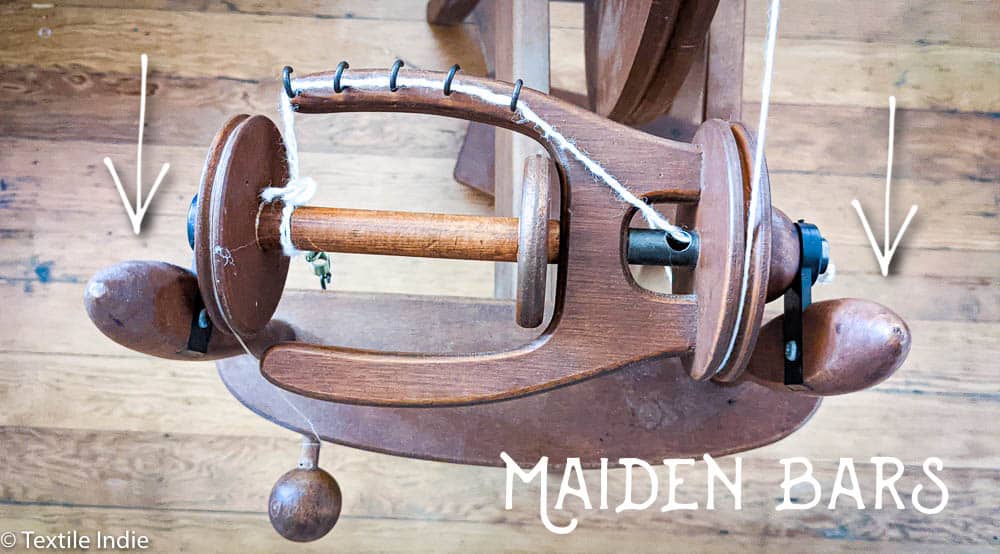 An Ashford Traditional Spinning wheel, detail view of the maiden bars