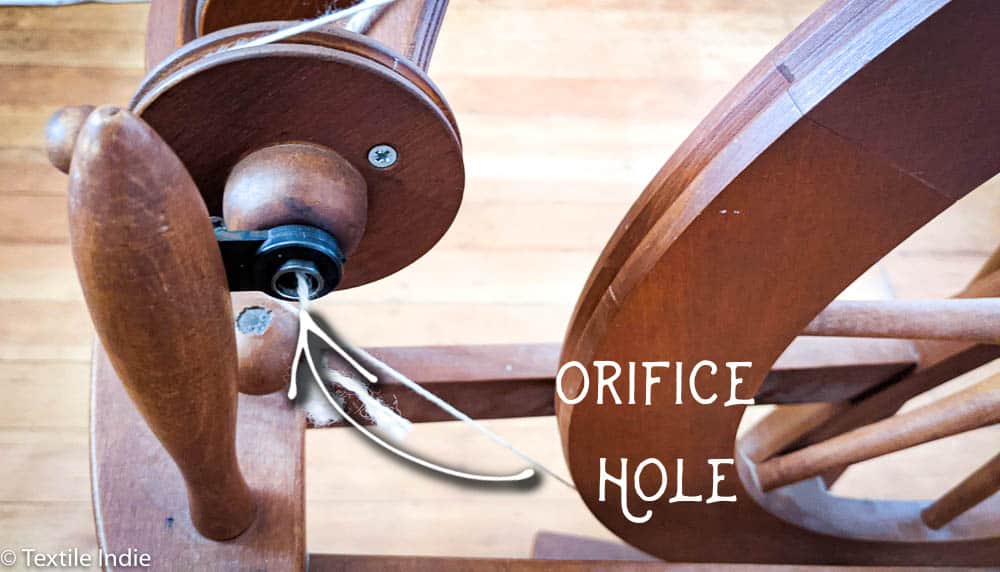 An Ashford Traditional Spinning wheel, detail view of the orifice hole