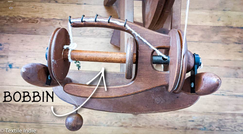 An Ashford Traditional Spinning wheel, detail view of the bobbin