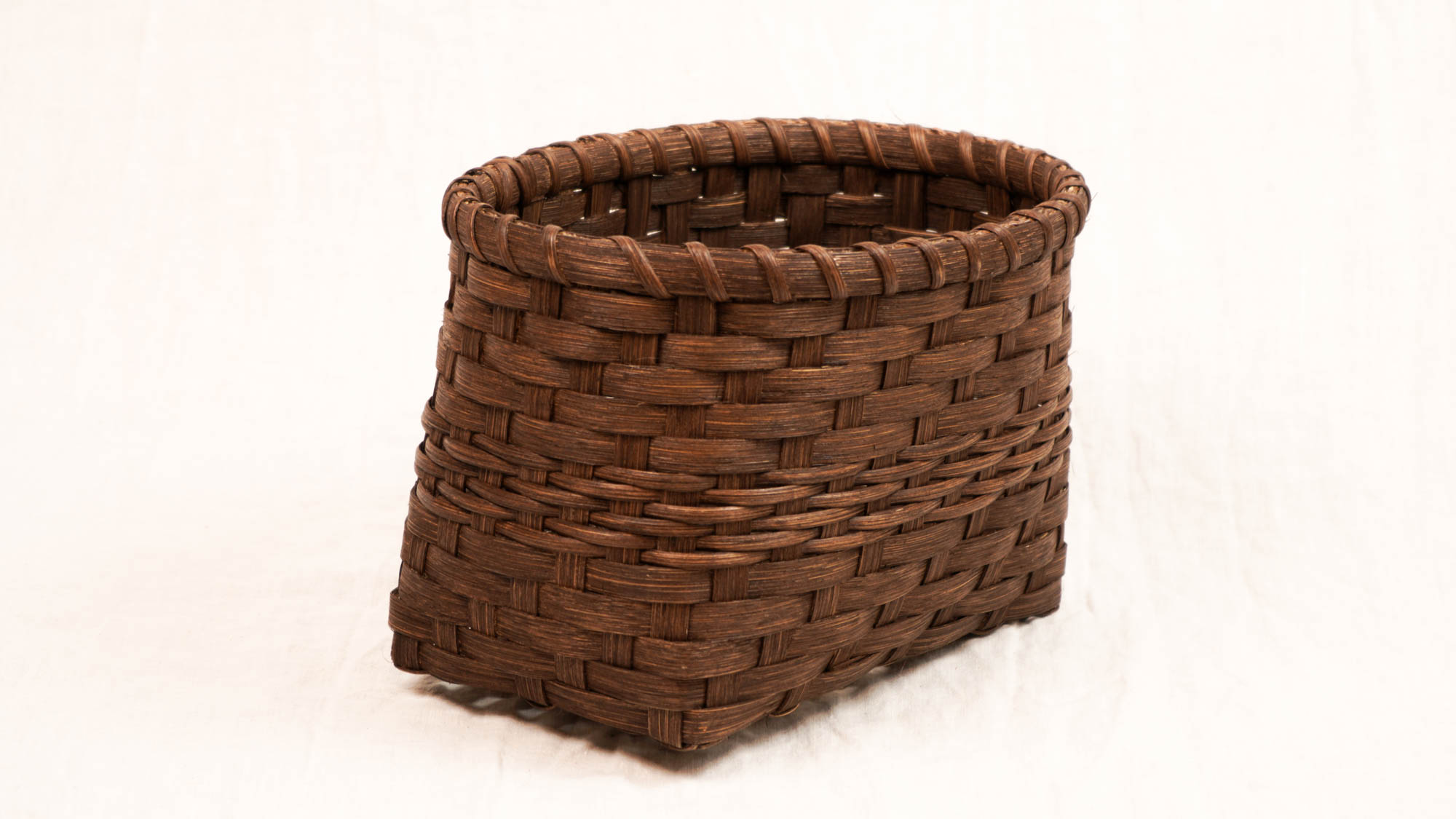handwoven, walnut dyed basket 