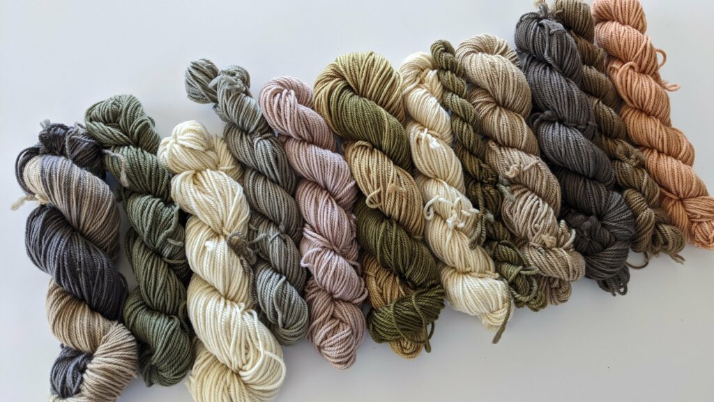 row of natural dyed skeins of yarn