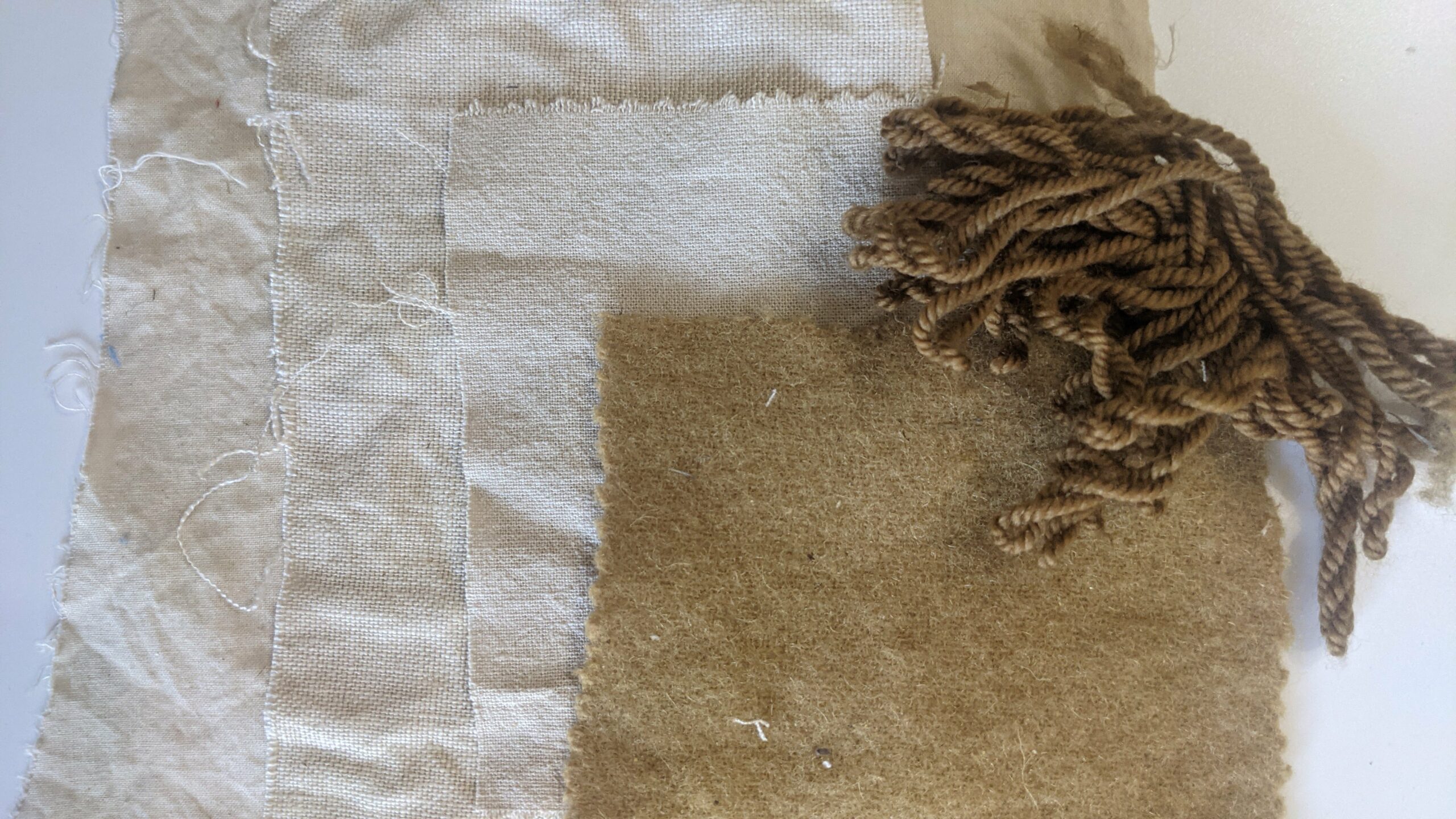 naturally dyed cream yarn and fabric samples