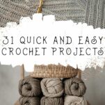 Shades of grey yarn and a length of crochet grey fabric.