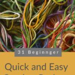 A tangle of yarn in greens, golds, and yellows.