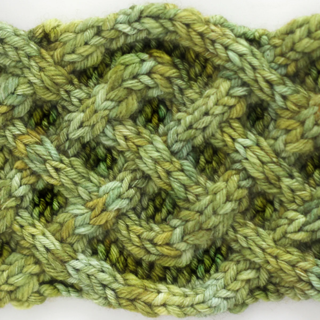 Studio Knit Celtic Cable Saxon braid knit project in various shades of green 